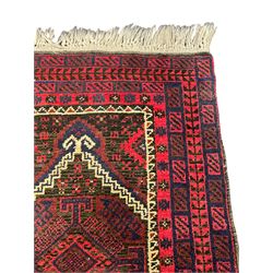Persian Baluch prayer rug, the pointed field decorated with lozenges and geometric motifs, repeating borders 