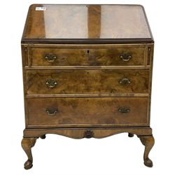 Mid-20th century walnut bureau desk, figured fall front enclosing fitted interior, three graduating drawers below, on cabriole feet