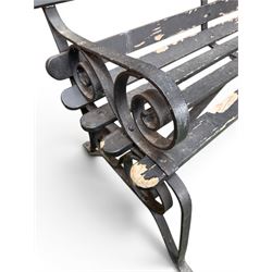 Coalbrookdale - rare pair of wrought iron and slatted wood garden benches, the twin wrought iron strapwork bench-ends formed of four scrolls over splayed feet, number 77 in the Coalbrookdale Castings Catalogue (see illustration)
