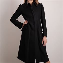 Prada - black Melton wool coat, in a redingote style with front fastening and fabric-covered buttons, flap pockets and a structured collar with slit to the back, size 44, unused with the original garment bag and hanger