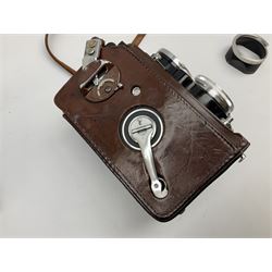 Franke & Heidecke Synchro-Compur Rolleiflex camera, twin lens camera, serial number 2447615, with viewing lens '1:2.8/80 Heidosmat No. 857174', Taking Lens '1:2.8/80 Carl Zeiss Planar No. 4189283', in leather case