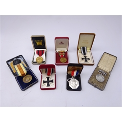  Seven medals comprising United Nations, US Service medal Indian Wars, LCC School Attendance 1911-12, 1935 Silver Jubilee and copies of Victorian Crimea medal and two German Iron Crosses (7)  