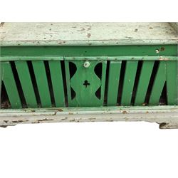 19th century painted pine hen coop settle, overhanging arched canape with dentil moulding and shaped edge, the panelled seat over a triangular platform base with removable hen-coop door, in green and white finish