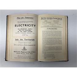Hull City A.F.C. - two bound volumes of 1940s home match programmes; volume one 1946-7 season containing twenty-six programmes from 31/8/46 to 7/6/47 including Hull City Boys game 5/4/47 against Leicester Boys; volume two 1947-8 season containing twenty-five programmes including Raich Carter's first game 3/4/48 having taken over as player/manager 1/4/48. Uniformly bound in black half leather. Provenance: By direct descent from the family of Raich Carter having been consigned by his daughter Jane Carter.