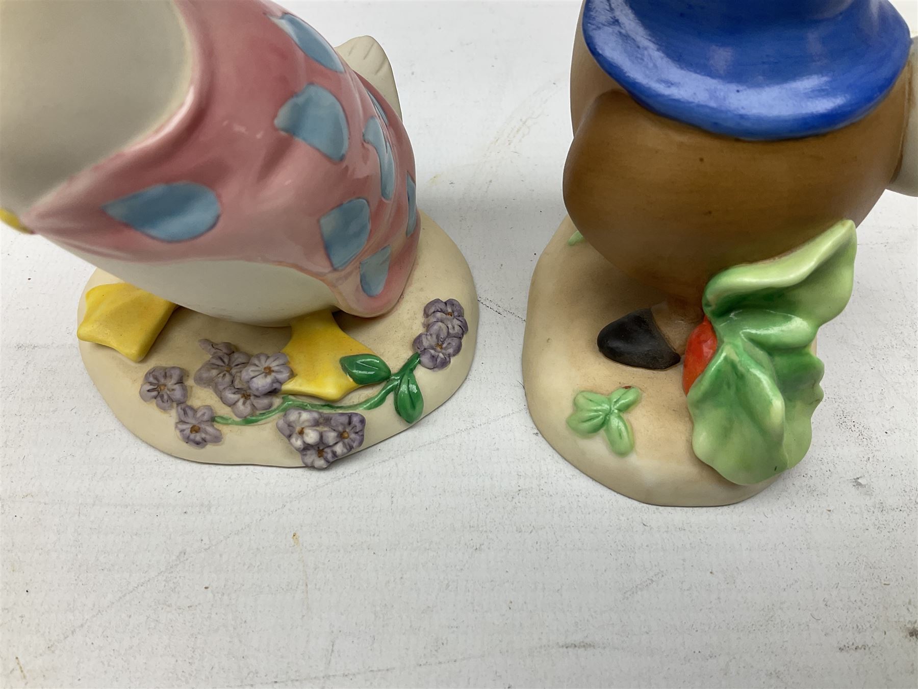 Two Border Fine Arts Peter Rabbits and Friends figures, comprising Peter Rabbit Love Radishes A2654 and Jemima Puddle-duck A2452