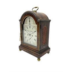 Robert Philip of London - English  late 19th century  8-day mahogany cased bracket clock, with a break-arch case and conforming glazed door, brass silk backed sound frets on a stepped plinth raised on ball feet, painted steel dial with with strike/silent and date dials, with Roman numerals, retailers name, minute markers and steel moon hands, twin train fusee movement striking the hours on a bell (with pull repeat}.