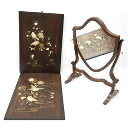 A pair of Japanese shibayama panels upon mahogany, decorated in ivory and mother of pearl with birds amongst blossoming flowers, H45cm L31.5cm, together with an early 20th century mahogany swing toilet mirror, of shield form, H49.5cm L35cm. 