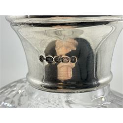 Modern silver mounted glass decanter, the cut glass body of circular form, with personal engraving, the silver collar hallmarked L J Millington, Birmingham 2008, overall H23.5cm