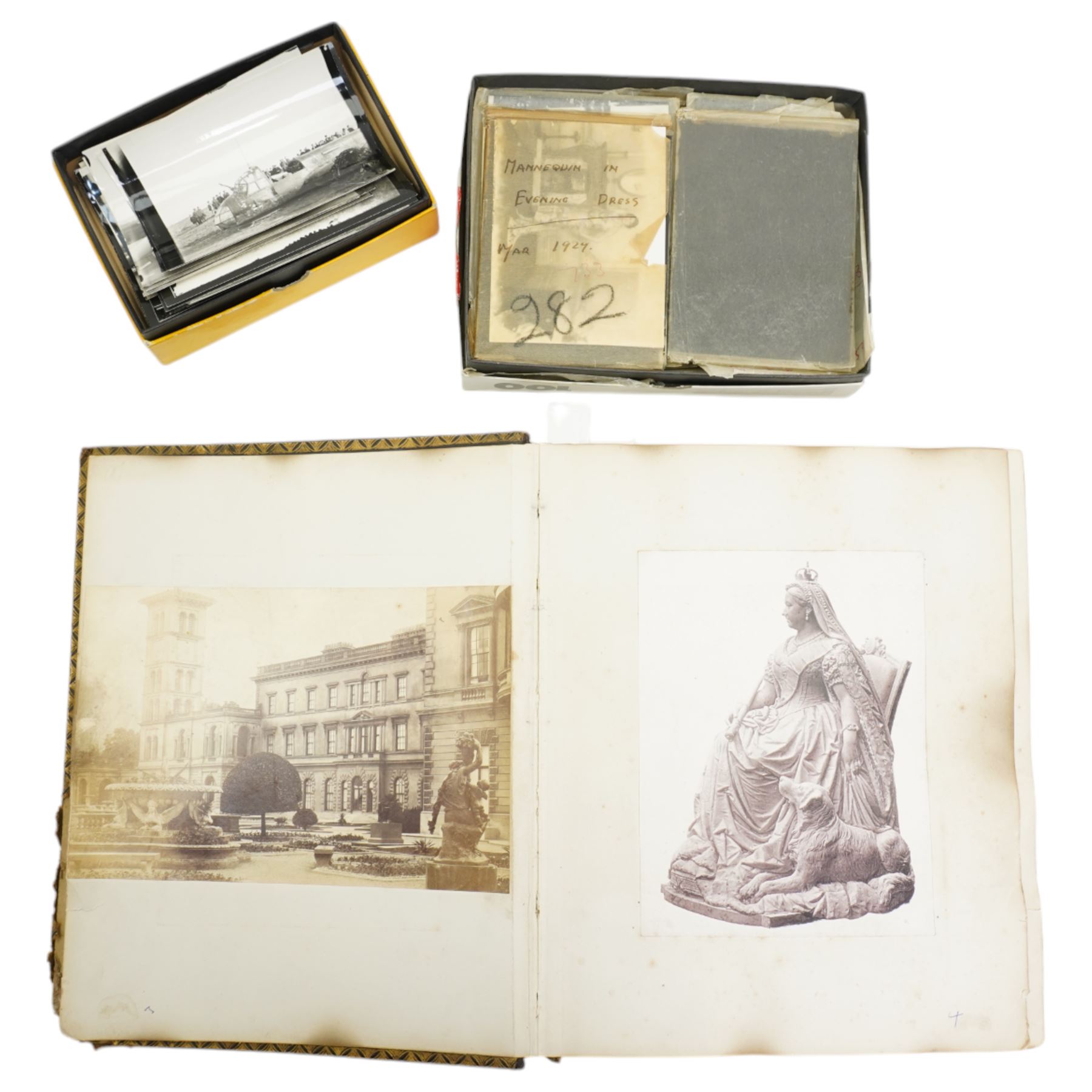 Early 20th century photograph album and contents of approximately 200 photographs and postcards including Alexandra Palace, Isle of Wight, views of Belgaum, India 1917, Palestine and Syria 1917-1919 etc, number of military glass slides and loose photographs