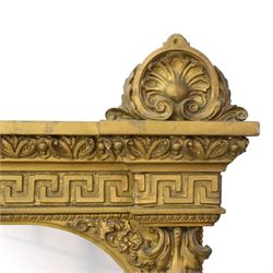 Large late 19th century gilt framed overmantel mirror, urn pediment above a foliate and Greek key frieze, egg and dart beaded edges, enclosing a plain mirror plate, with scrolled lower sections