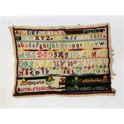  Victorian sampler worked with the alphabet by Carrie Monkman 1886, Victorian silver-plated cigarette case, Carlo simulated tortoiseshell motorised fan in case, Folding Opera Glasses, two chrome leaping Jaguar brooch and matching pin badge, quantity of sewing threads, lace etc