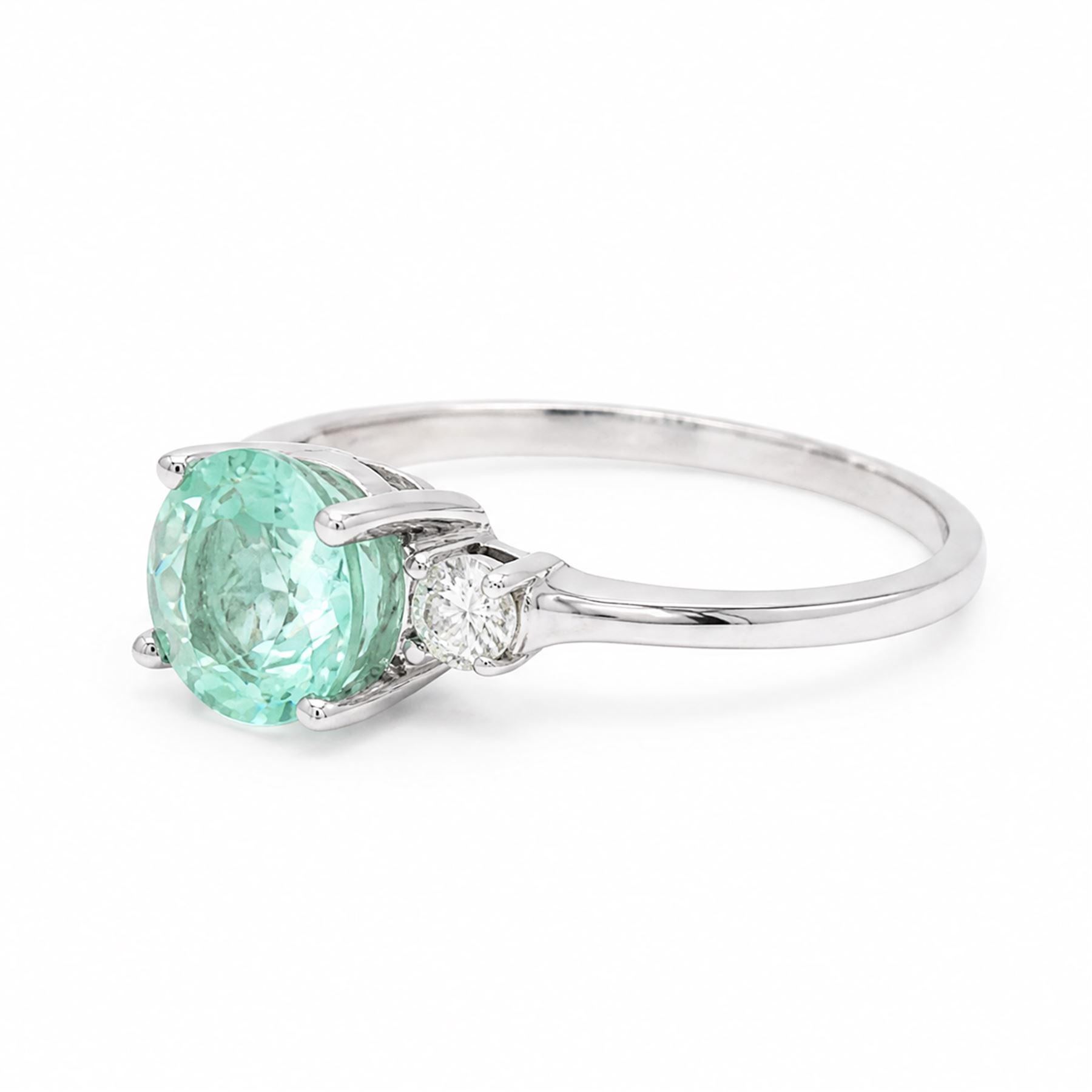 18ct white gold Paraiba tourmaline and diamond three stone ring, single round cut tourmaline of approx 1.50 carat, with a single round brilliant cut diamond set either side, hallmarked, total diamond weight approx 0.15 carat