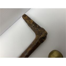 Four wooden walking canes, including a carved mahogany snooker cue example, tallest H86cm