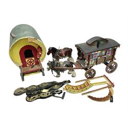 Two ceramic shire horse and gypsy caravans, together with horse brasses 