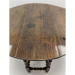 Late 17th century William & Mary oak drop leaf dining table, oval drop leaf top, single drawer to one end, gate action base, turned supports joined by bobbin turned stretchers, 121cm x 135cm, H75cm (open)