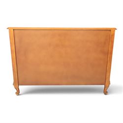 And So To Bed - 'Louis XV' large cherrywood chest, bowed shaped top above three long graduating drawers, blackened metal handles and escutcheons, raised on scrolled supports with carved foliate knees 