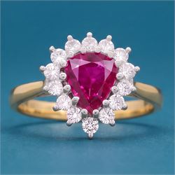 18ct gold ruby and diamond cluster ring, single pear cut ruby of approx 1.05 carat, surrou...