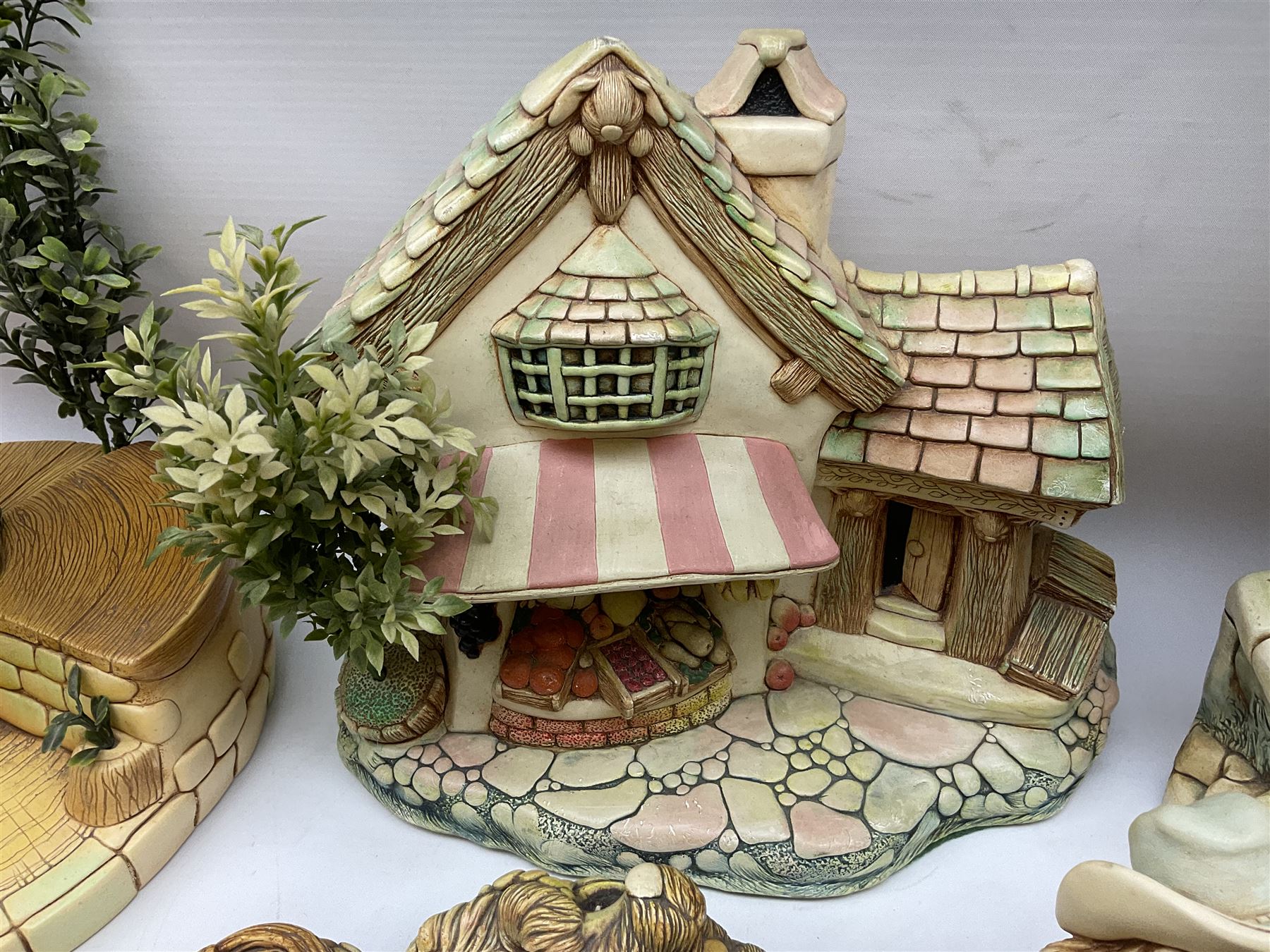 Extensive collection of Pendelfin rabbits and stands, to include Betsy Barge, Fruit Shop, Uncle Soames, Event Piece etc, many with original boxes 