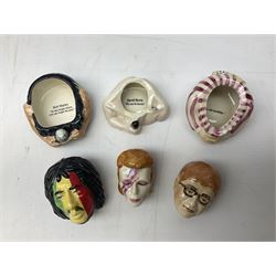 Fifteen Face Pots by Kevin Frances, all of music interest, to include the Beatles; Paul 'Kookoocachu', 'Love Is All You Need', 'Octopus's garden', 'While My Guitar Gently Weeps', 'All You Need Is Love' and 'Everybody's talking and no one says a word', Elton John; I'm still standing, Buddy Holly; 'That will be the day', David Bowie 'We can be heroes' , Mick Jagger prototype colour type etc, all boxed  