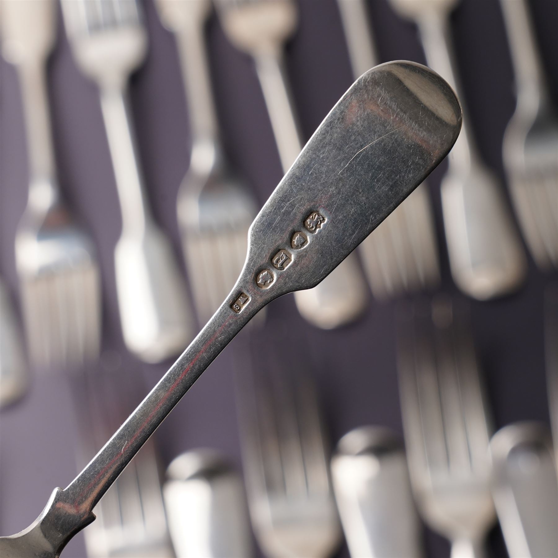 Suite of Victorian silver fiddle pattern cutlery comprising eighteen table forks, seventeen dessert spoons, fifteen dessert forks and three table spoons London 1856 Maker A B Savory & Sons