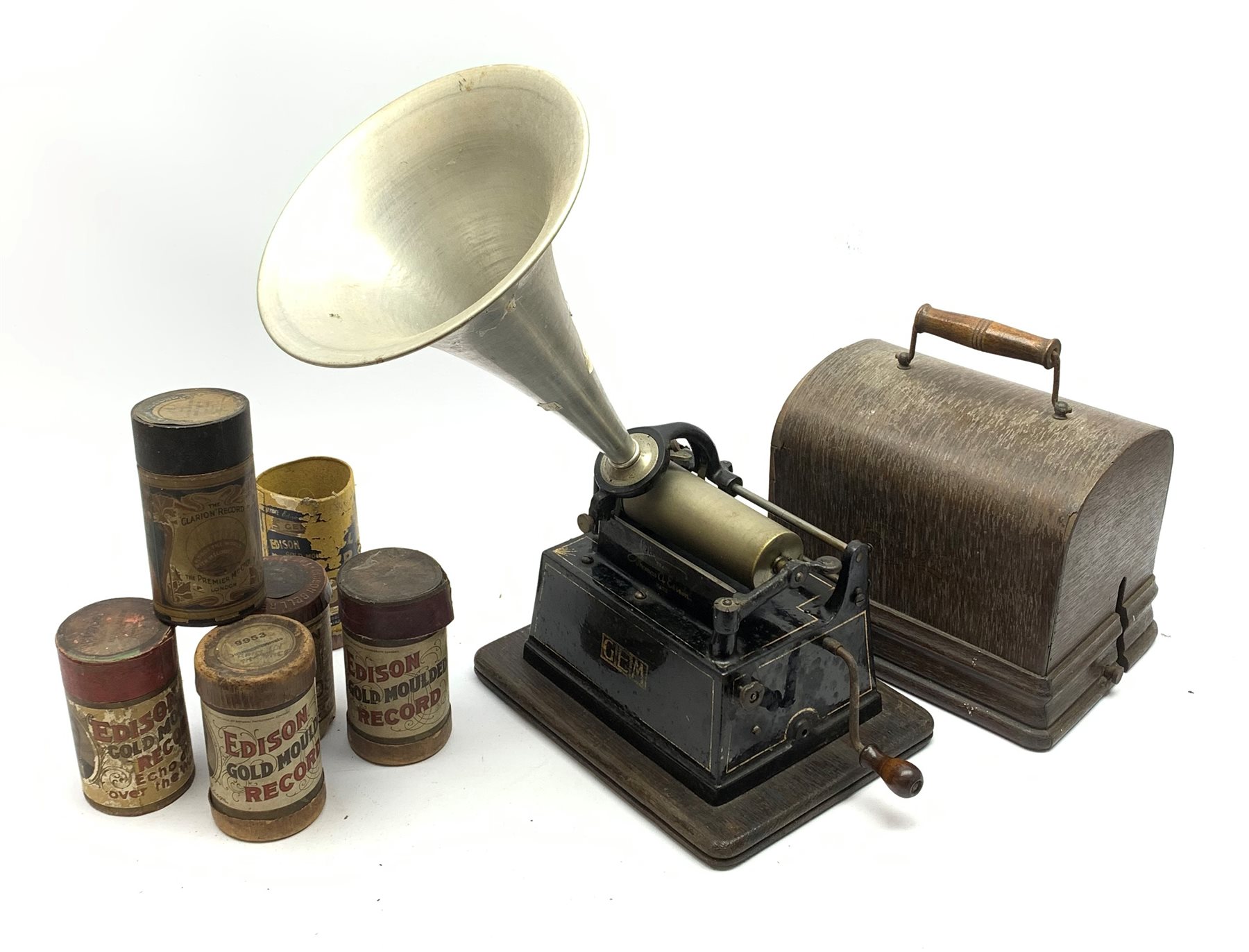  Early 20th century Edison Gem phonograph, the reproducer marked Model-C, with lift-off oak cover, Serial No.G204826, last patent date 1903, with white metal horn, W25cm, and six cylinders/boxes  