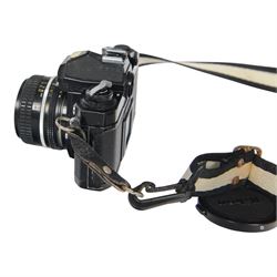 Two Nikon FM camera bodies, comprising Nikon FM serial no. 3239117, with a Nikon Series E 36-72mm 1:3.5 zoom lens and a Nikon FM2 serial no. 7141741, with a Nikkor 50mm 1:1.8 lens and a Nikon Series E 70-210mm 1:4 zoom lens