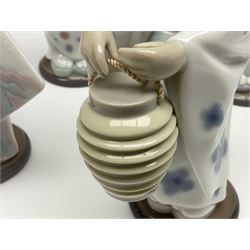 Six Lladro figures of the China doll set and Oriental doll set, comprising Playing the Flute no.6150, Bearing Flowers no.6151, Flower Gazer no. 6152, Oriental Dance no. 6230, Oriental Lantern no. 6231 and Oriental Beauty no. 6232, largest H20cm