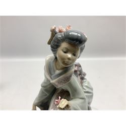 Two Lladro Japanese Ladies figures, comprising Kiyoko no 1450 and Yuki no 1448, both issued 1983, retired 1998, largest example H20cm