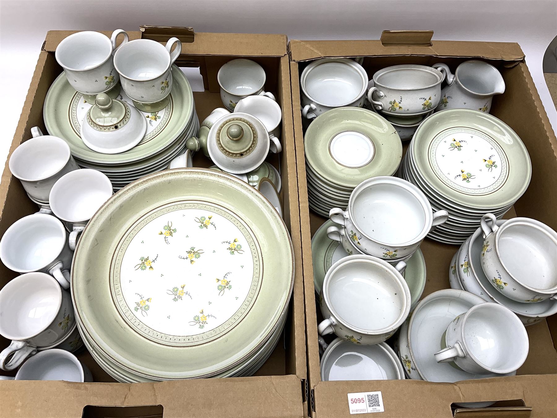 Quantity of Denby Verona pattern tea and dinner wares, decorated with floral sprays and within green borders, to include lidded twin handled bowls, teacups and saucers, dinner plates etc in two boxes