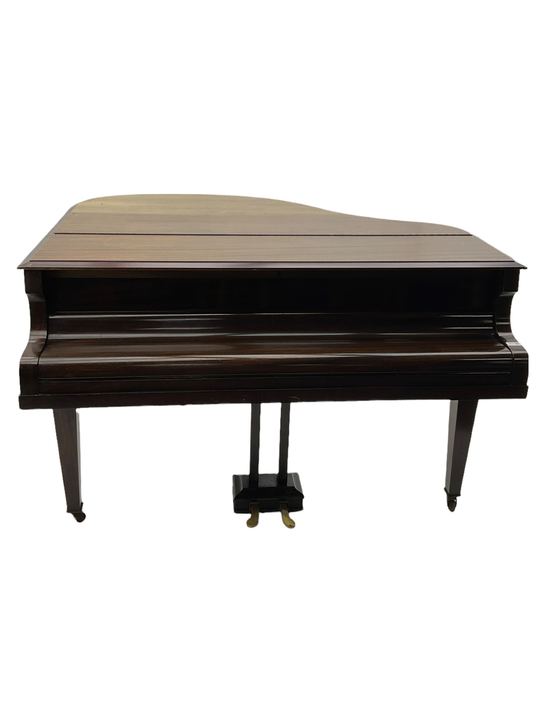 A mid 20th century English baby grand piano by Osbert, with an iron frame and overstrung stringing in a mahogany case,  conforming Lyre with sustain and una corda pedals and music desk, with original stringing, hammer action, dampers and felts, 7-1/4 octaves with 88 original ebony and ivory covered keys, with stool