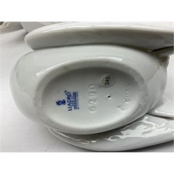 Four Lladro dove figures, comprising Taking Flight no 6288, Dove no 1015, Proud Dove no 6290 and Peaceful Dove no 6289, all with original boxes, largest example H20.5cm 