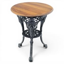 20th century stained hardwood pub table, round boarded top with moulded rim, supported on ...