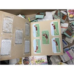 Floral tapestry in a mahogany frame, large collection of cigarette cards, framed tapestry, small microscope and a wooden correspondence box, frame H66cm