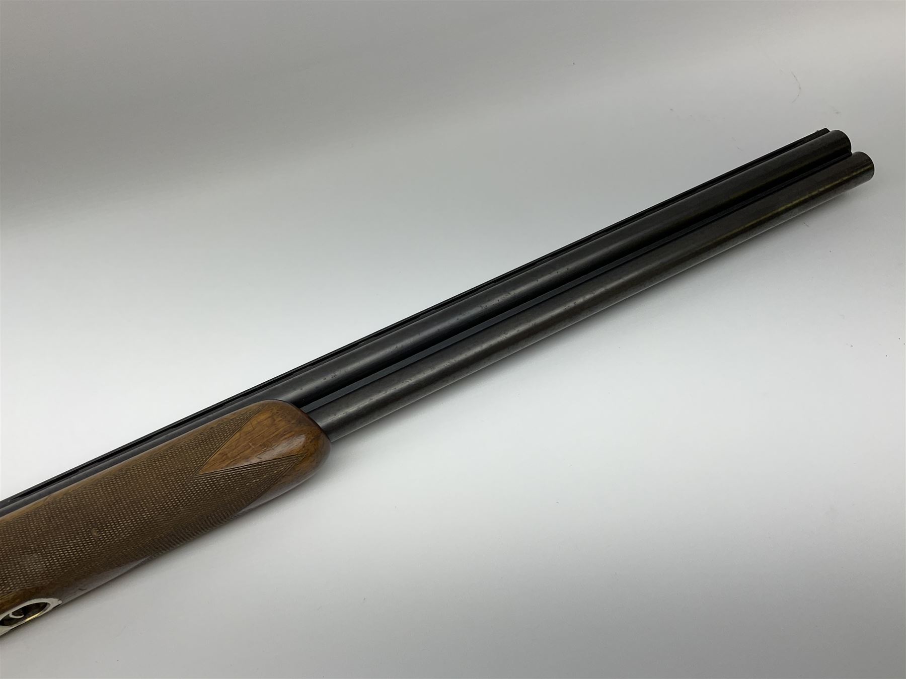 French Verney Carron 12-bore over-and-under double barrel boxlock ejector sporting gun, 71cm barrels, walnut stock with chequered grip and fore-end and thumb safety, serial no.336224X, L115cm RFD ONLY AS BARRELS MARGINALLY IN PROOF