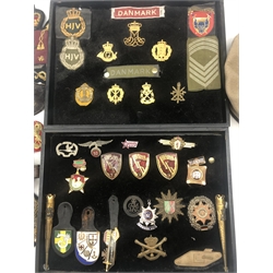  Territorial SAS cap by Compton Webb, WO1 arm badge, and wrist band, WO2 (QMSI) wrist band, Irish Guards badges etc, etc, two framed displays of various GB and Foreign Army badges, incl. Wound Badge, Guards Polo Club fob tank emblem, Russian, Cuba, German etc   