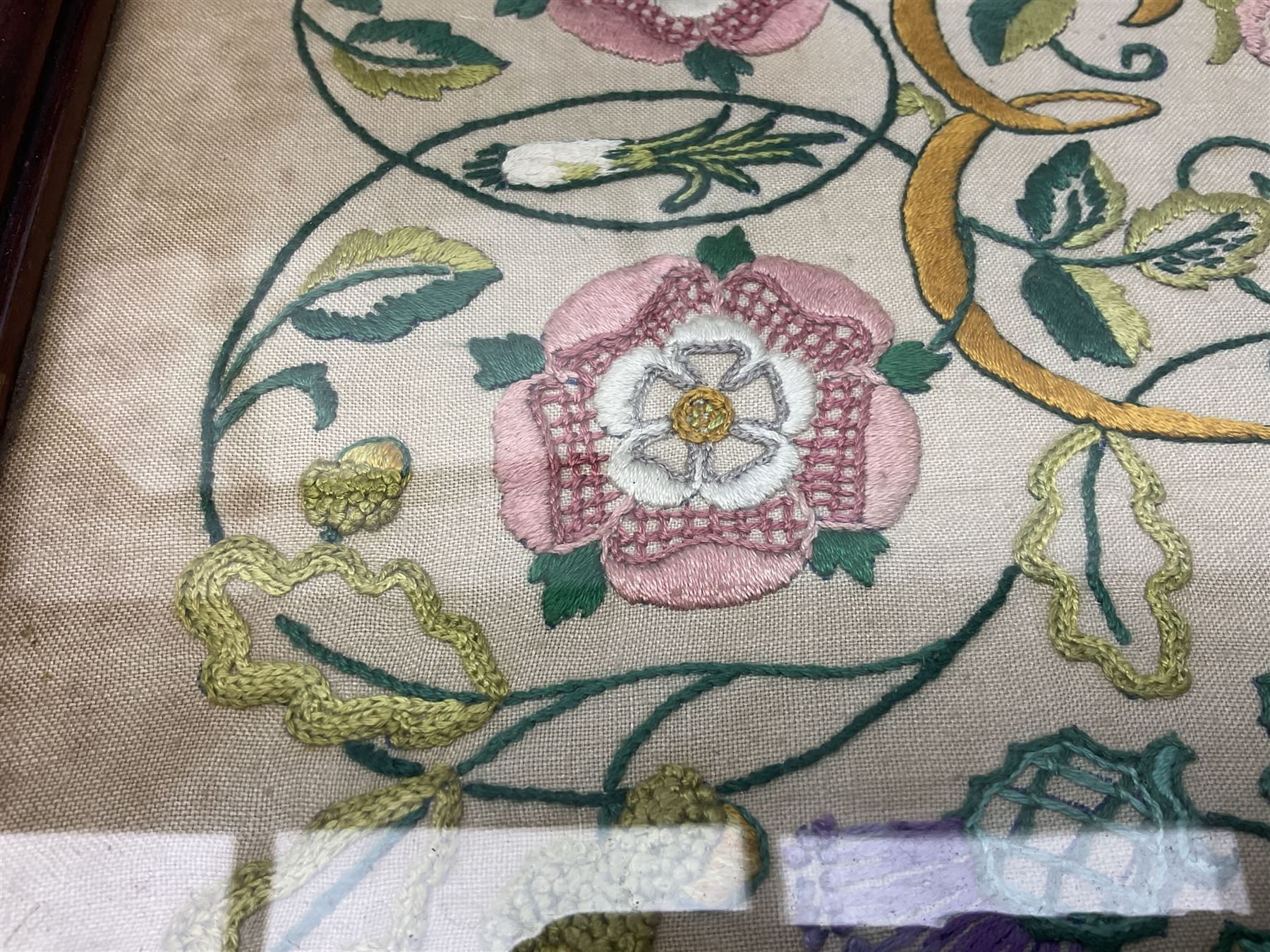 Two 1950s tapestries, the framed example celebrating the 1953 coronation, the second converted into a fire screen depicting a floral display, firescreen H70cm (2)