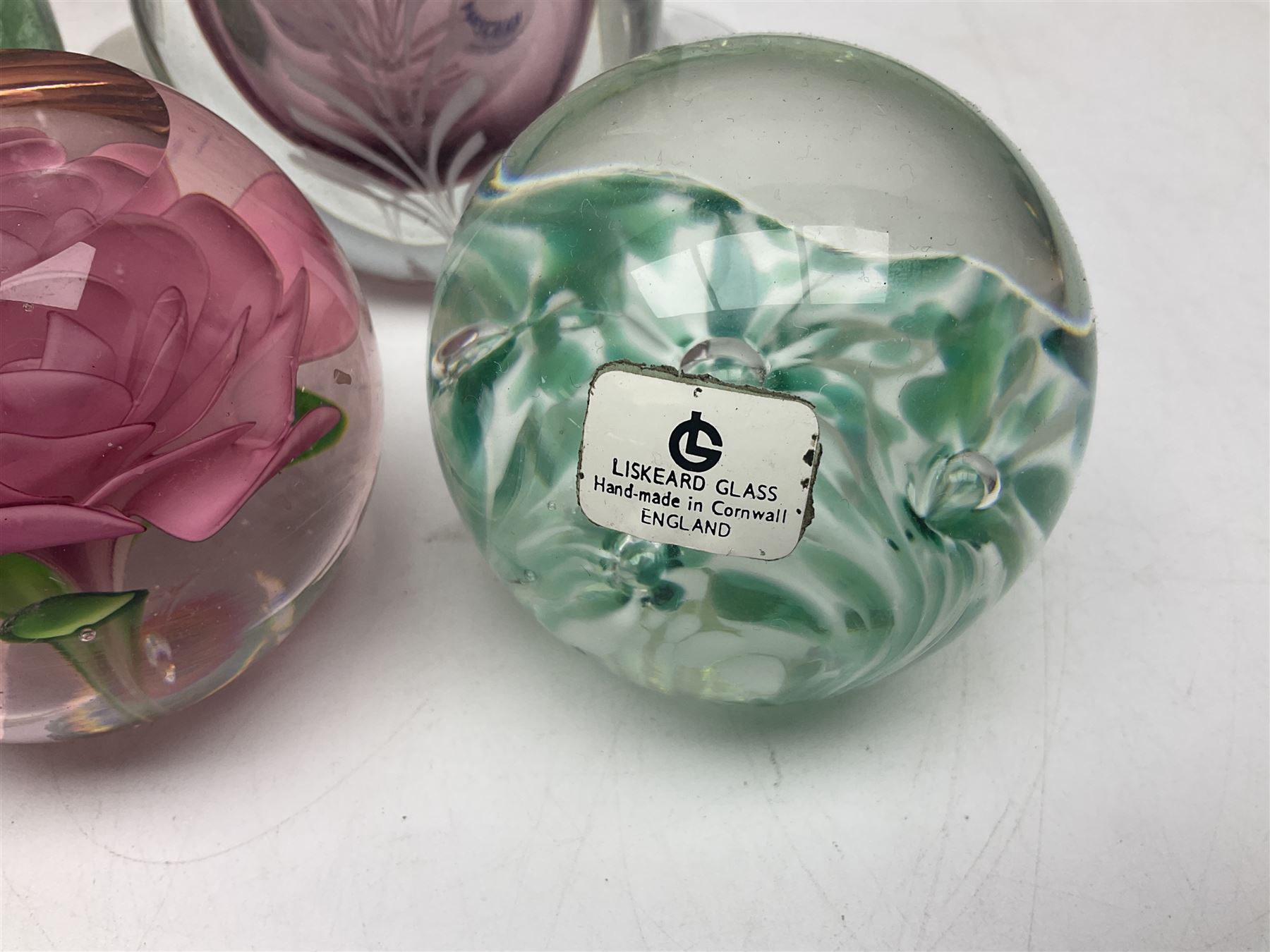 Five Babycham glasses, together with five paperweights, to include examples from Liskeard glass etc