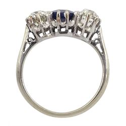 Early 20th century gold three stone old cut diamond and round sapphire ring, sapphire approx 0.60 carat, total diamond weight approx 1.00 carat
