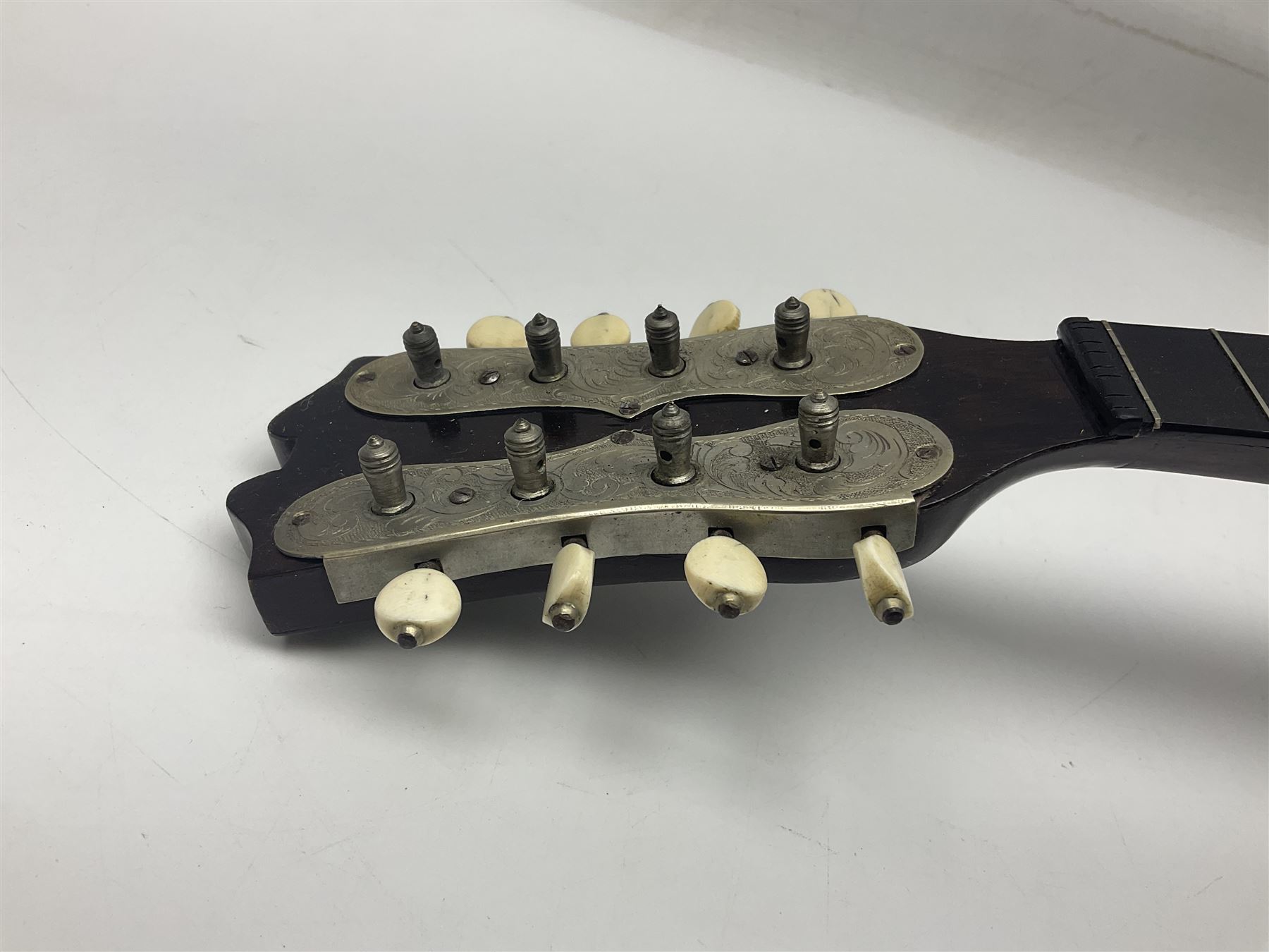 French mandolin with segmented lute back and mother-of-pearl inlaid spruce top; bears label for 'Jerome Thibouville-Lamy & Cie Paris L60cm; and another unmarked flat-back mandolin; both for completion (2)