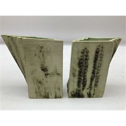 Pair of Carn Pottery Penzance vases of fan form, with tube lined floral and stylised decoration, stamped and marked X9 to base, H11.5cm