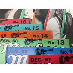 Monkees memorabilia - 'Monkees Monthly' magazine almost complete run from No.1 Feb 67 to No.31 Aug 69 (lacking nos.29 and 32); the cover of No.1 signed by all four members of the group during their 1997 Reunion Tour; quantity of A&BC bubble gum cards; programme for their only UK live performance in 1967 at Empire Pool Wembley; and other related late 1960s music magazines/paperback book