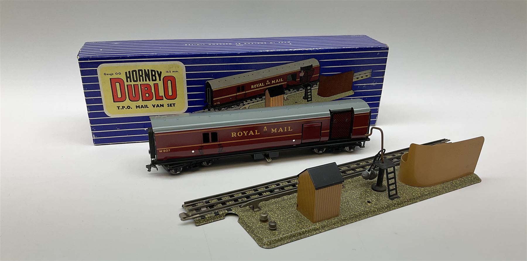 Hornby Dublo - Breakdown Crane No.4062 with screw jacks in plain red box with end label; D1 Girder Bridge, boxed; and T.P.O. Mail Van Set, boxed with mail bags (3)
