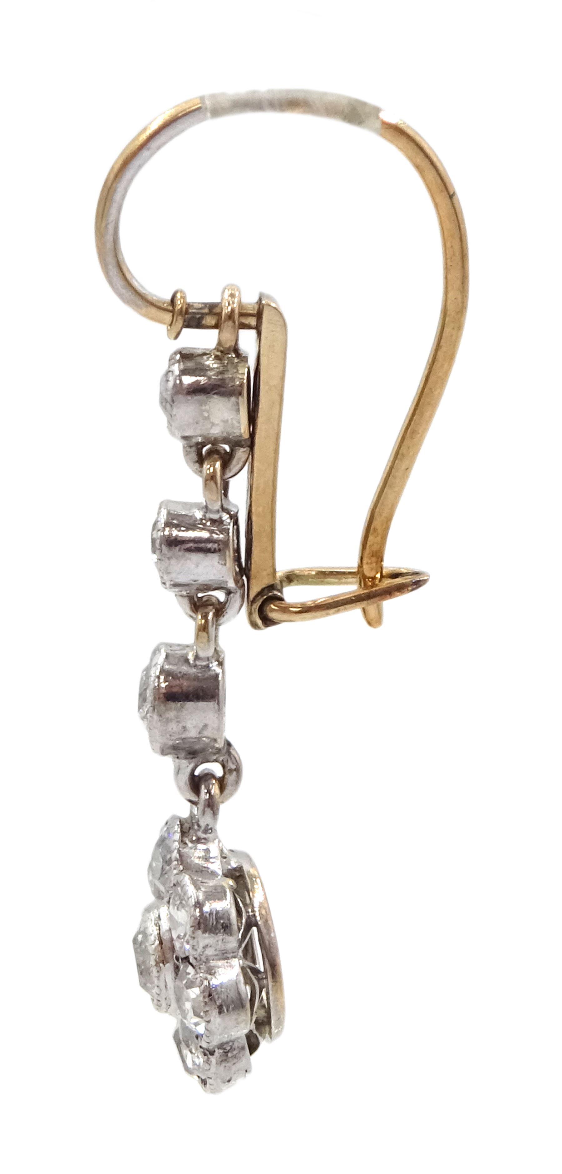 Pair of early 20th century gold and silver milgrain set old cut diamond cluster pendant earrings, total diamond weight approx 1.00 carat