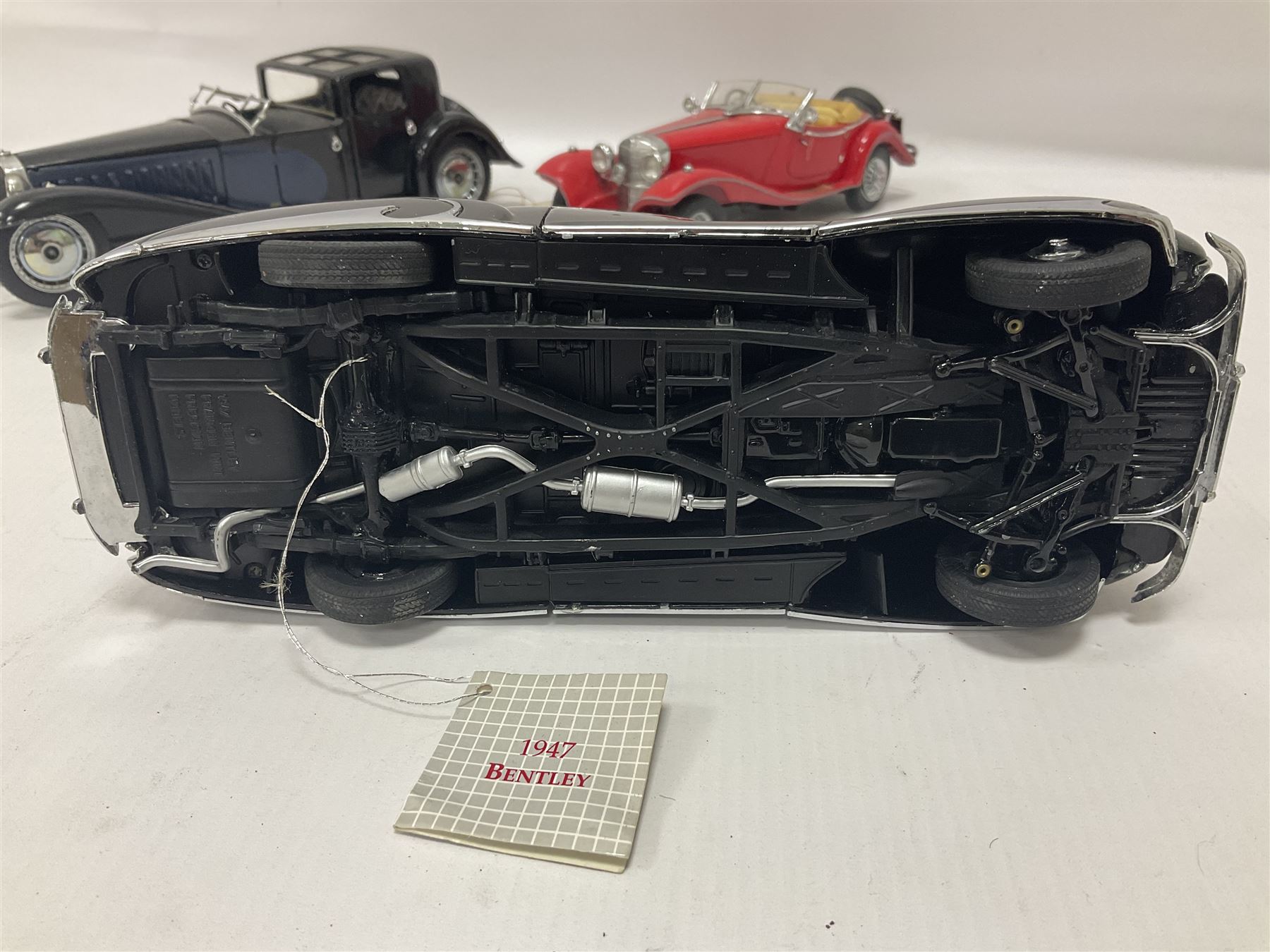 Franklin Mint - five 1:24 scale die-cast precision models comprising 1930 Bugatti Royale Coupe Napoleon, 1933 Duesenberg SJ Twenty Grand, 1935 Mercedes Benz 500K Special Roadster, 1938 Jaguar SS-100, and 1947 Bentley 