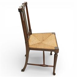 Pair of Morris & Co ‘Hampton’ design chair attributed to H. Howes, the shaped rectangular back with central splat over a rushed seat, on turned supports united by stretchers