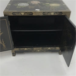  Chinese black lacquered side cabinet, floral pattern, two doors enclosing single shelf, W66cm, H61cm, D41cm  