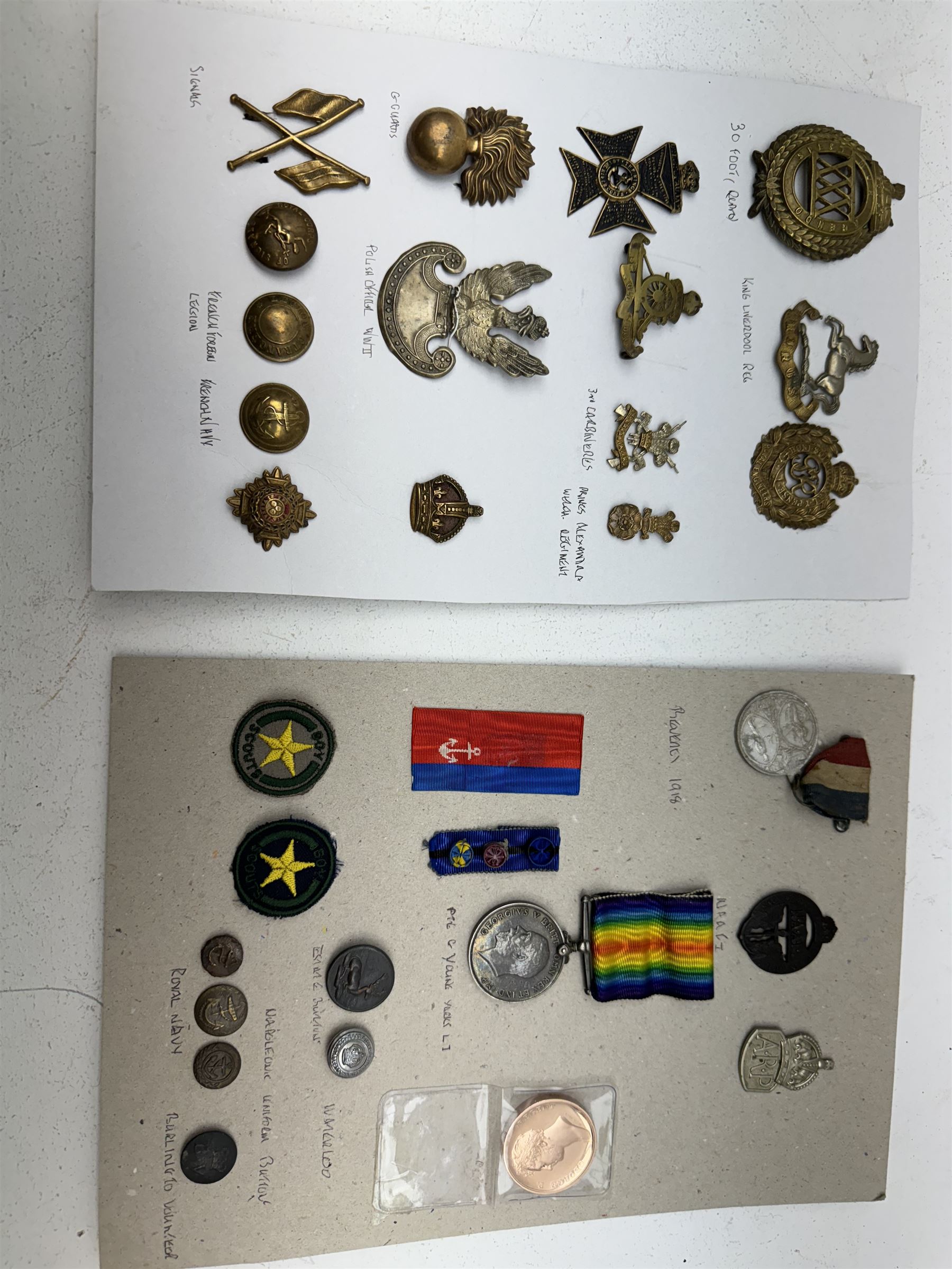 WWI British War Medal named to '60638 Pte C. Young Yorks L I' together with various cap badges, ration books and other military related items 