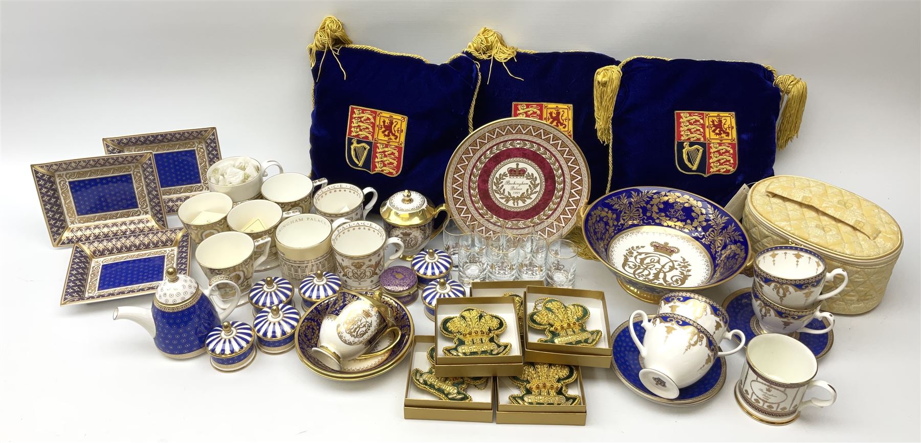 Commemorative ware Including five green and gold Highgrove limited edition hand embroidered tree decoration, a collection of ceramic ware from the royal collection including four cups and saucers, small teapot,    three trinket trays, five trinket pots with lids, eight tot glasses, three William Edwards Queens 80th cup, Hudson & Middleton hinged box etc. 