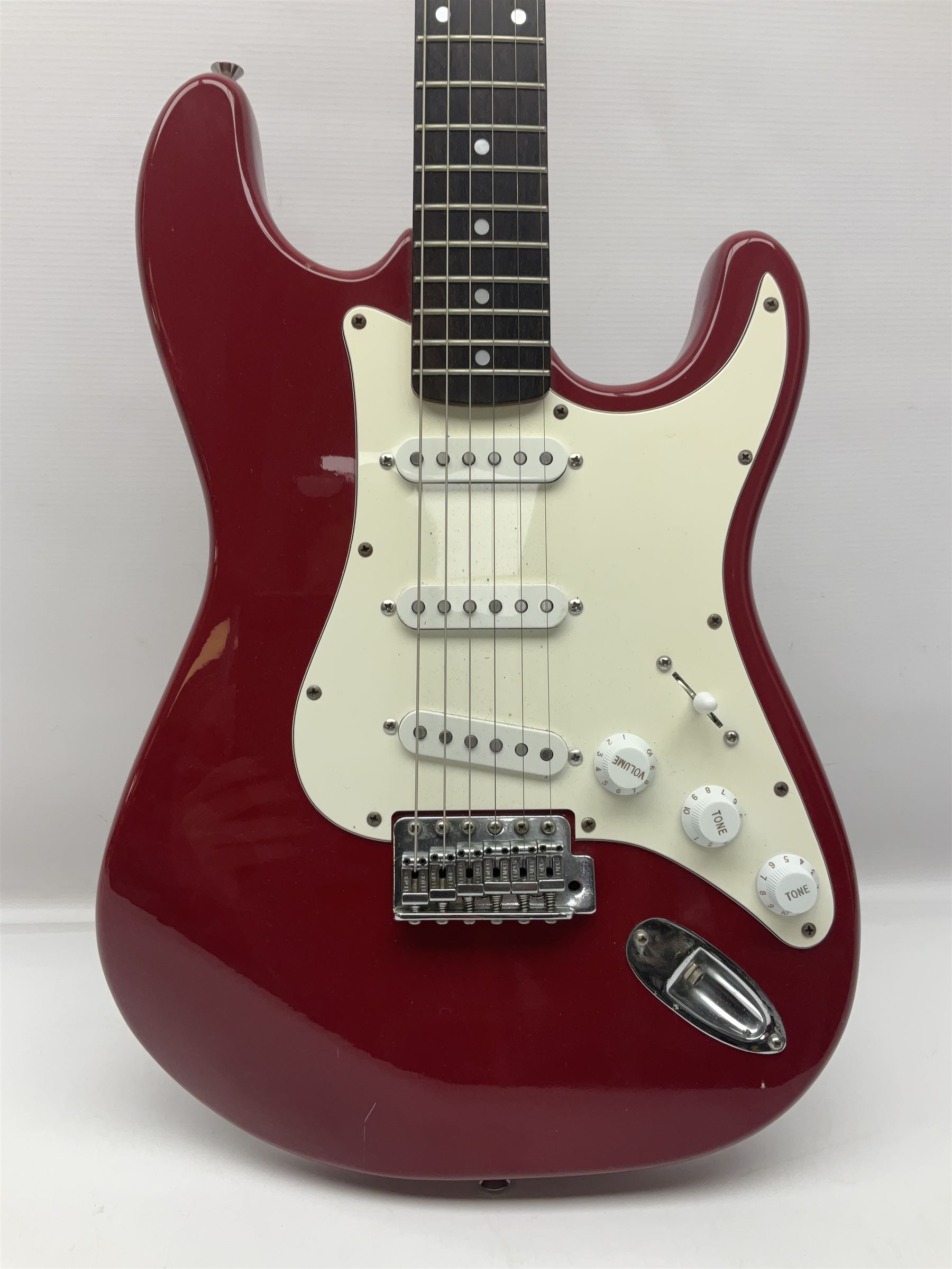 1990s Korean Squier Fender Stratocaster electric guitar in cherry red; serial no.S965951, L98cm