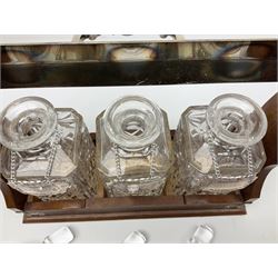 Edwardian silver plate mounted oak tantalus, containing three square sided cut glass decanters, complete with key, H33cm